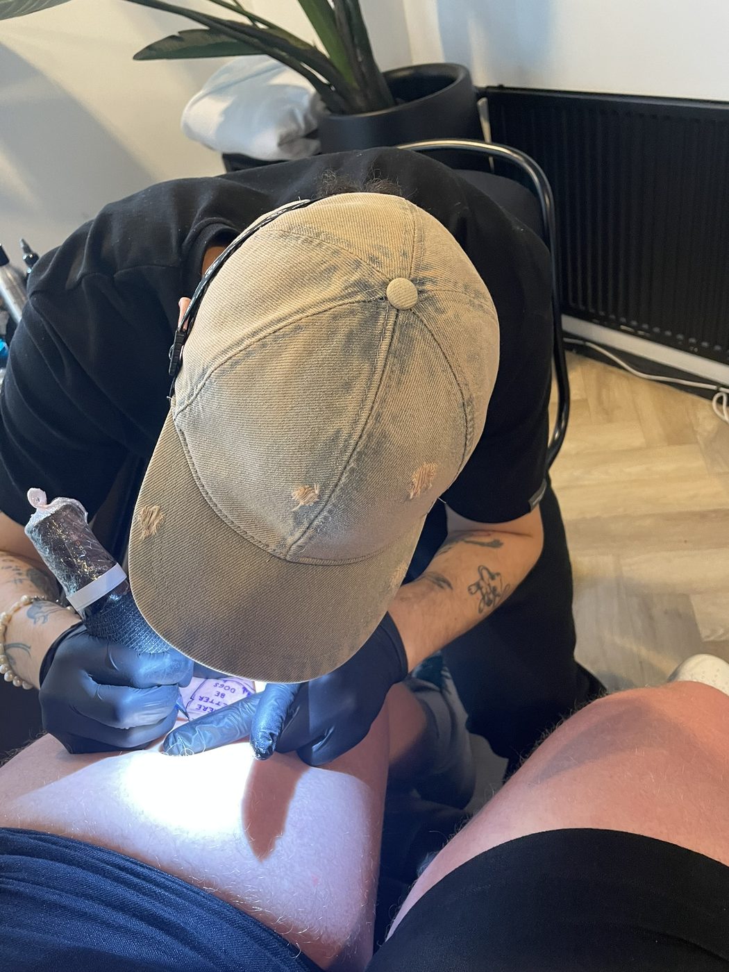 Tattoo artist Dylan Hoogerwerf at work in his studio