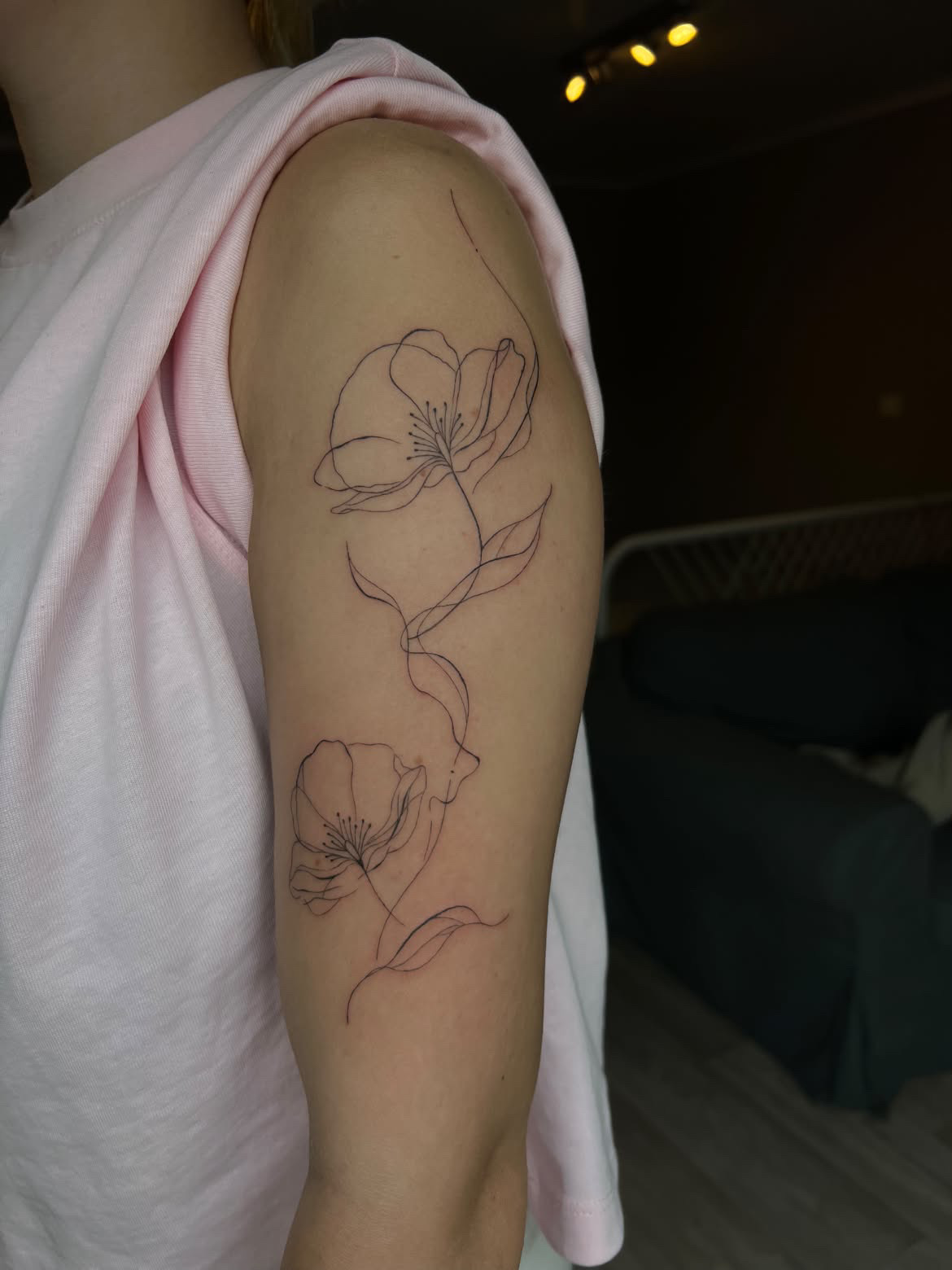 Fine-line flower tattoo by Linéa D'amore