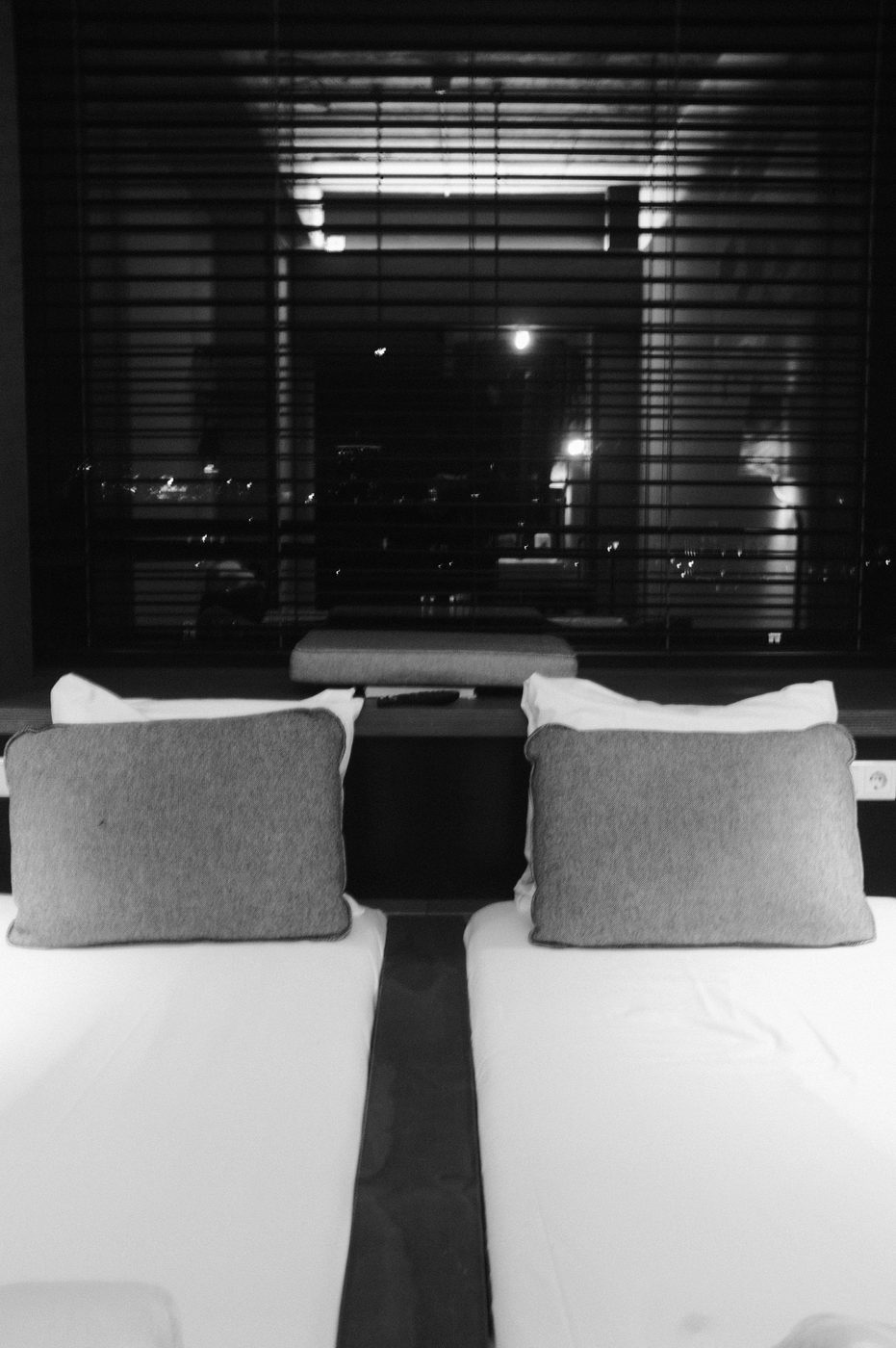 Volkshotel room with city view at night